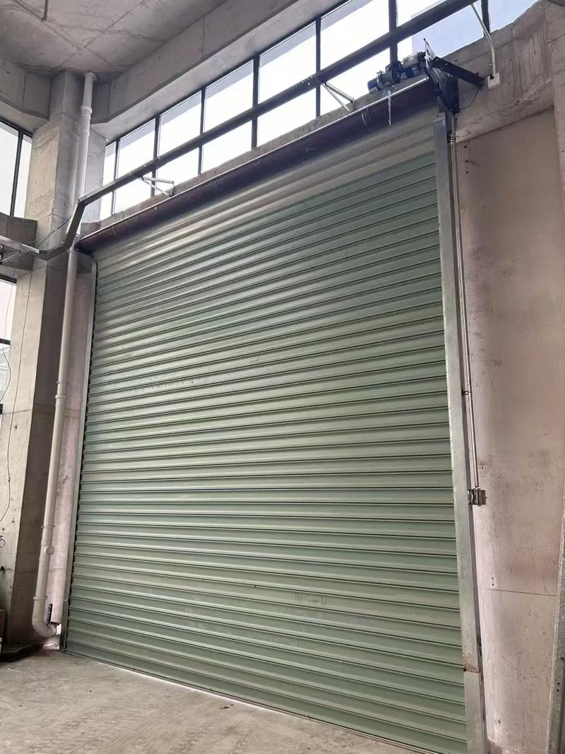 千禧门业 专业安装维修车库卷帘门与电动伸缩门的一站式解决方案